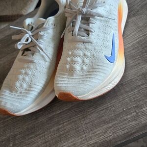 Nike Running Shoes with Blue Swoosh